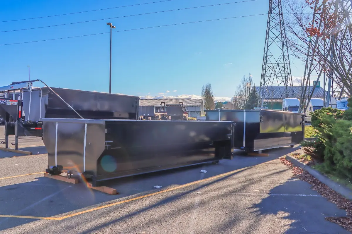 Roll-off dumpster ready for waste disposal at job site for 4 Yard Dumpster Rental in Lee